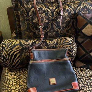 Dooney & Bourke Black Leather Crossbody with Brown Trim and Red Interior